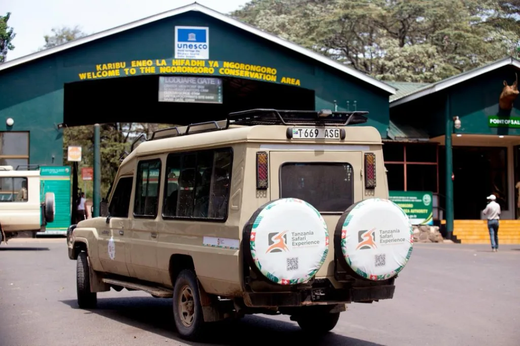 Official entrance gate at Ngorongoro Conservation Area Tanzania showing safari vehicle check-in.
