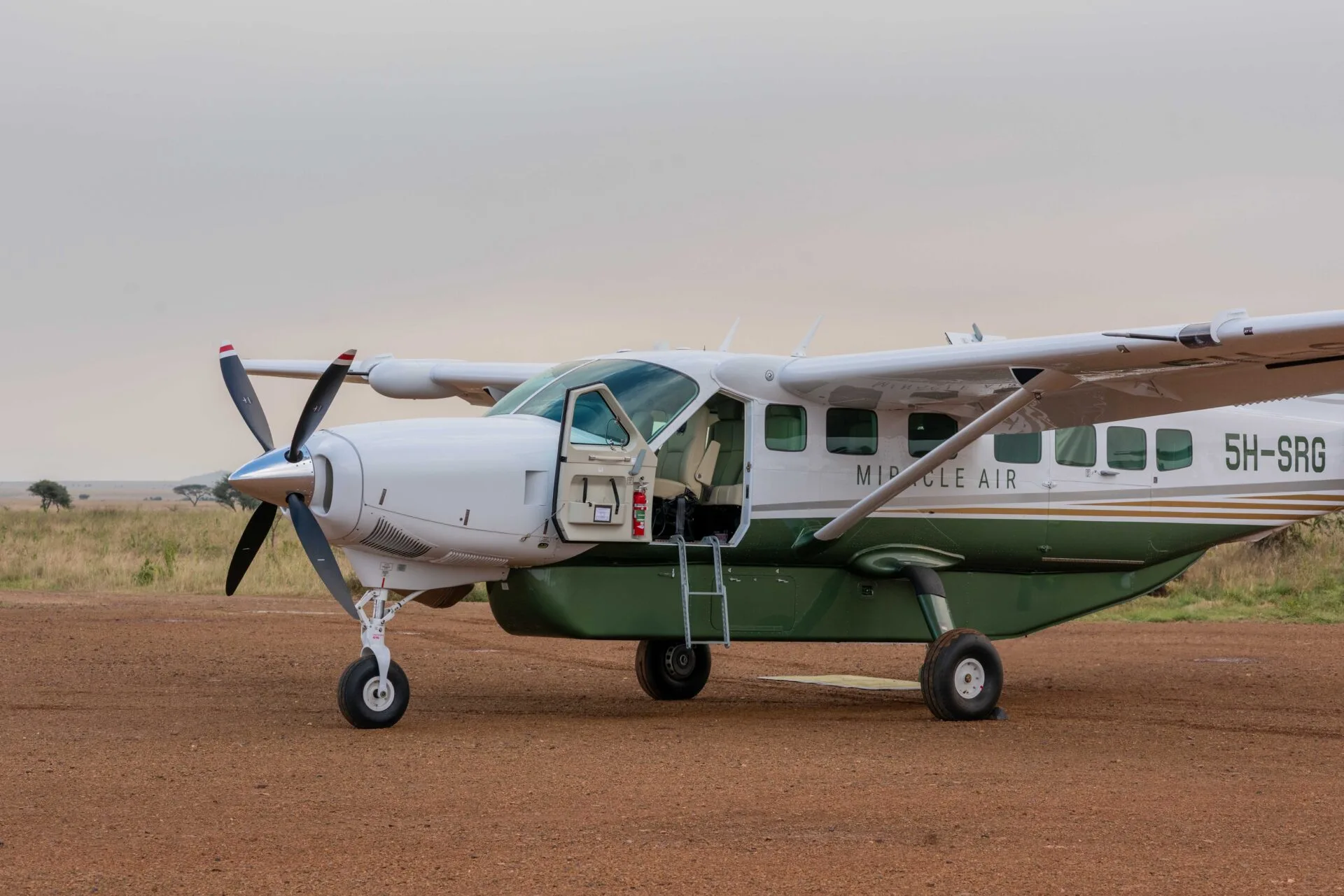 Charter flight landing at a remote safari airstrip in Western Tanzania.