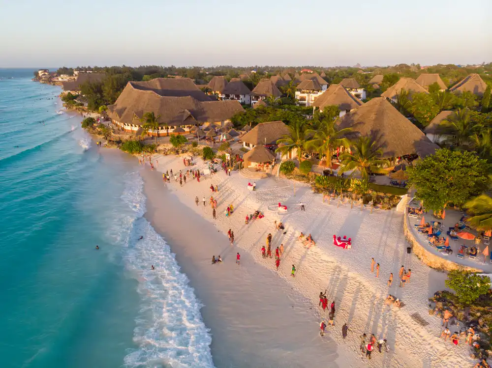 Aerial view of Nungwi beach in Zanzibar showing white sand and turquoise ocean.