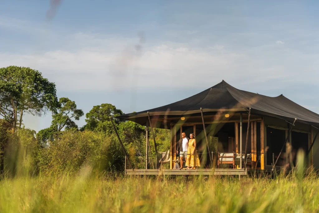 Guests on Private Deck at Wilderness Mara, Kenya