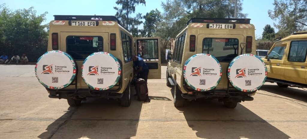 Tanzania Safari Experience vehicles welcoming guests from Kenya at Isebania Border for a Serengeti safari.